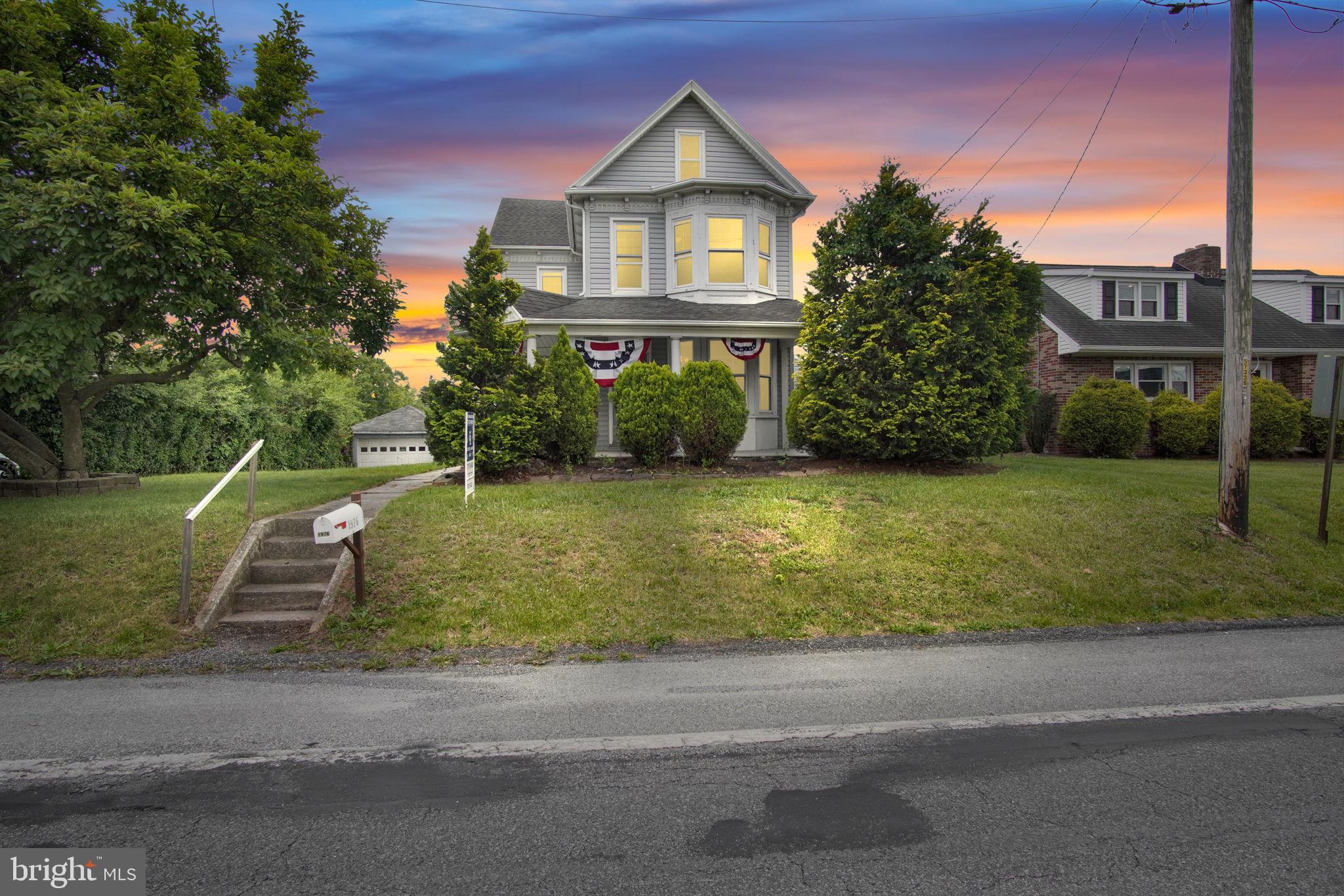 1976 Carlisle Road York, PA 17408 - Photo 1 of 39 Charming home with sunset backdrop.