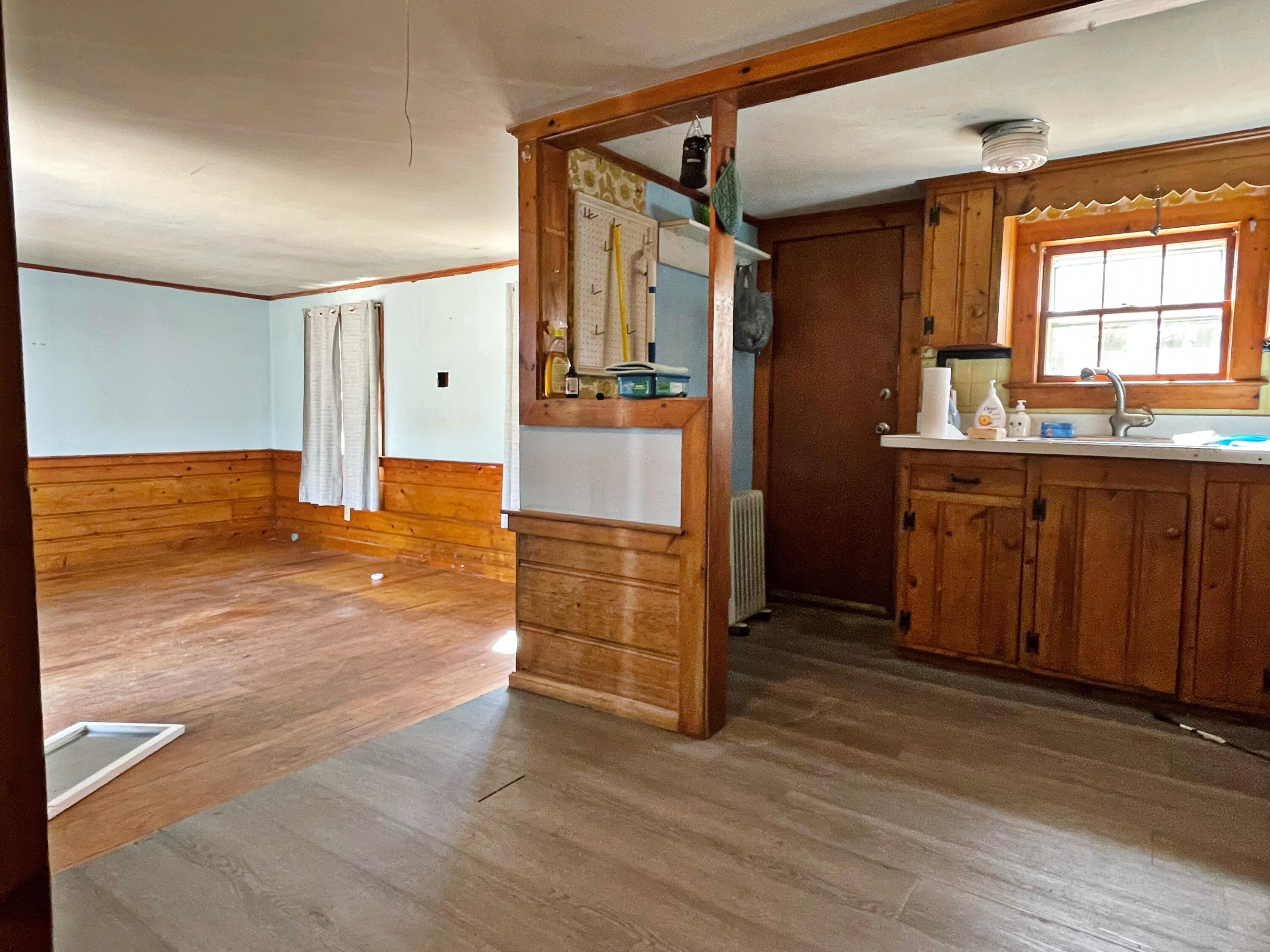 175 Telegraph Road Dennis Port, MA 02639 - Photo 8 of 12 a view of kitchen with wooden floor and window