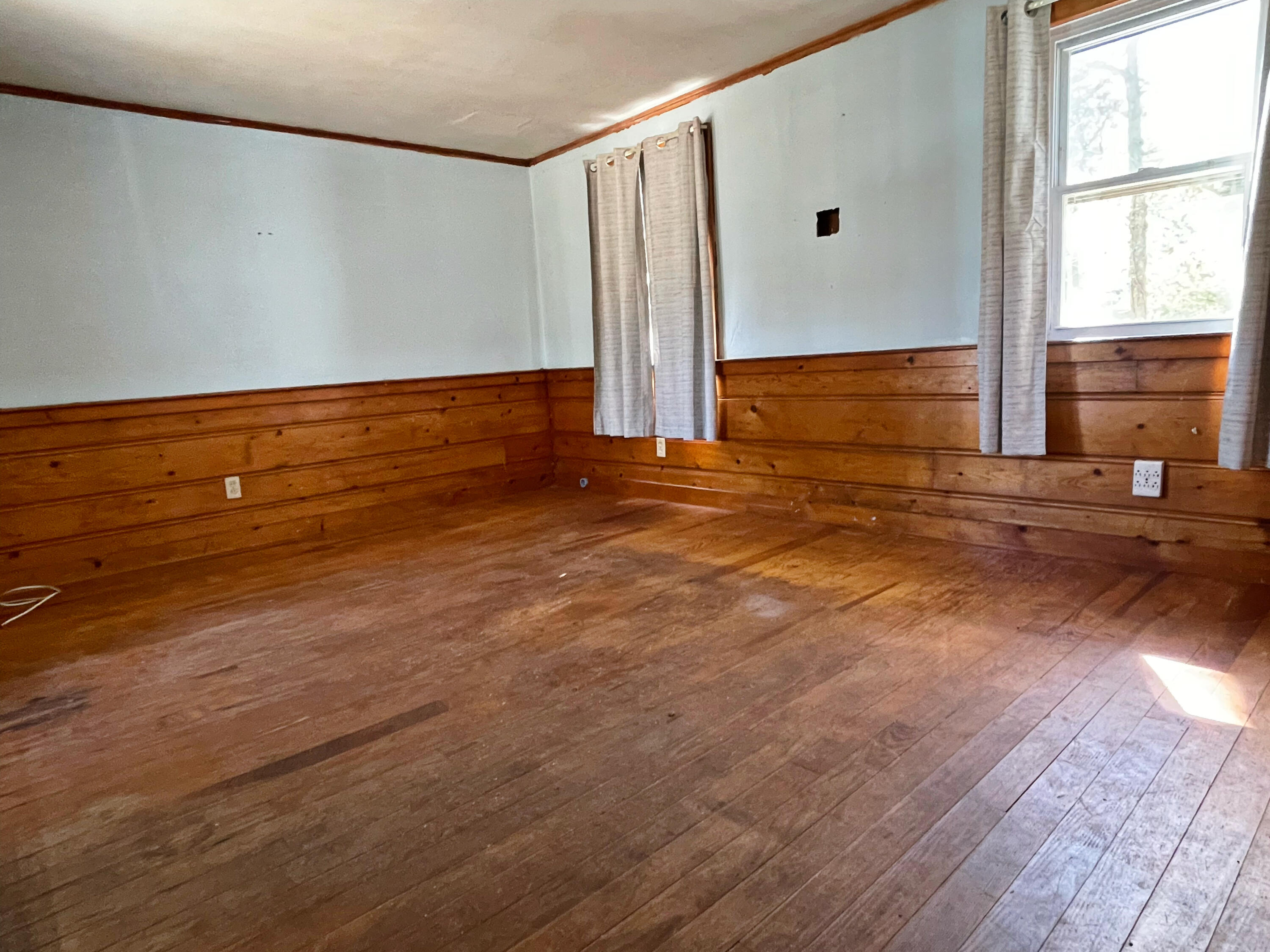 175 Telegraph Road Dennis Port, MA 02639 - Photo 9 of 12 a view of an empty room with a window