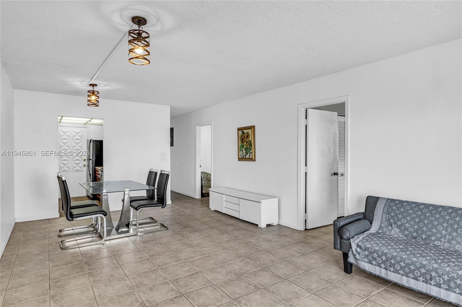 200 South Birch Road, Unit 1015 Fort Lauderdale, FL 33316 - Photo 11 of 36 a living room with furniture and a couch