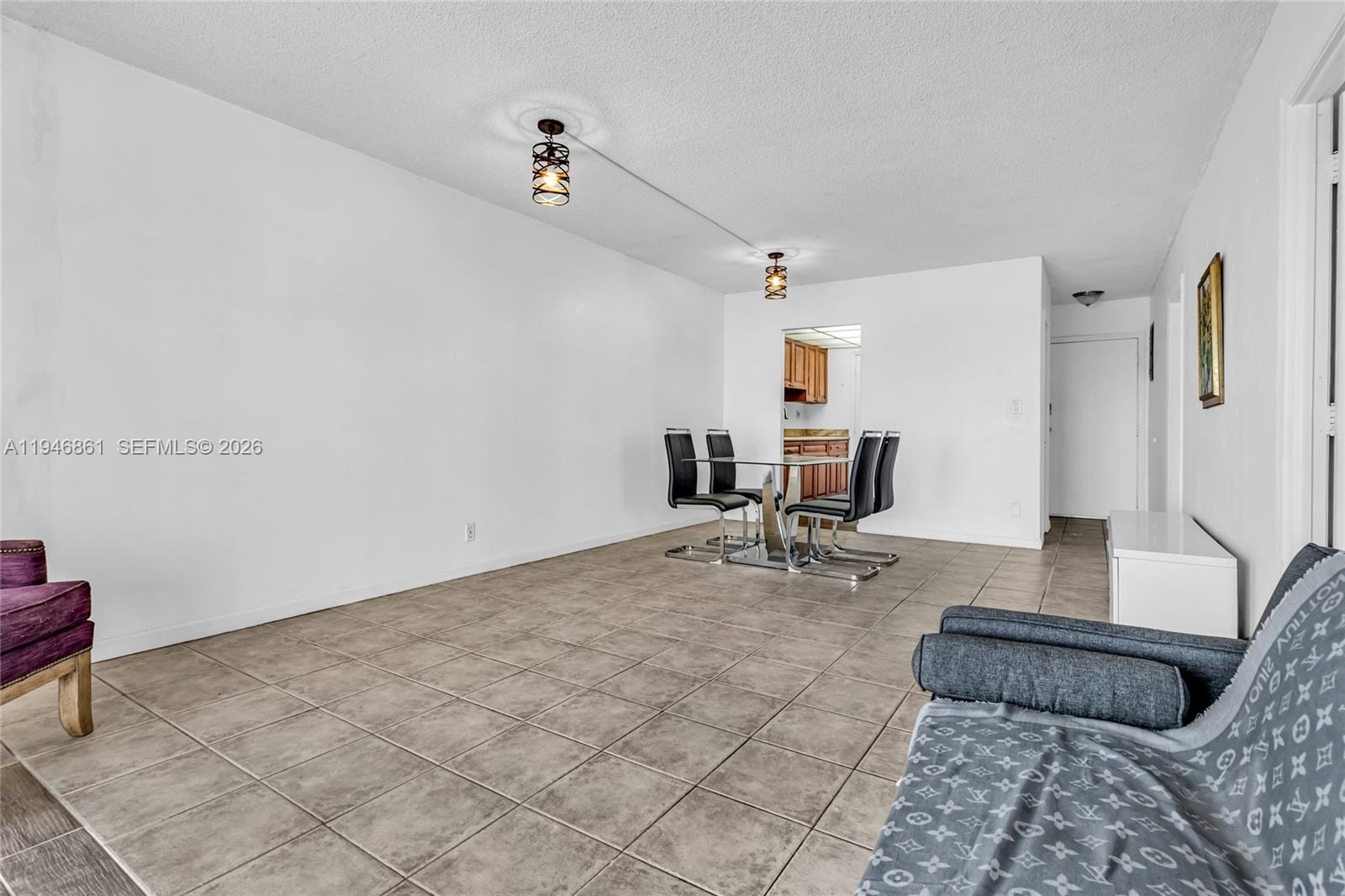 200 South Birch Road, Unit 1015 Fort Lauderdale, FL 33316 - Photo 12 of 36 a living room with furniture and a couch
