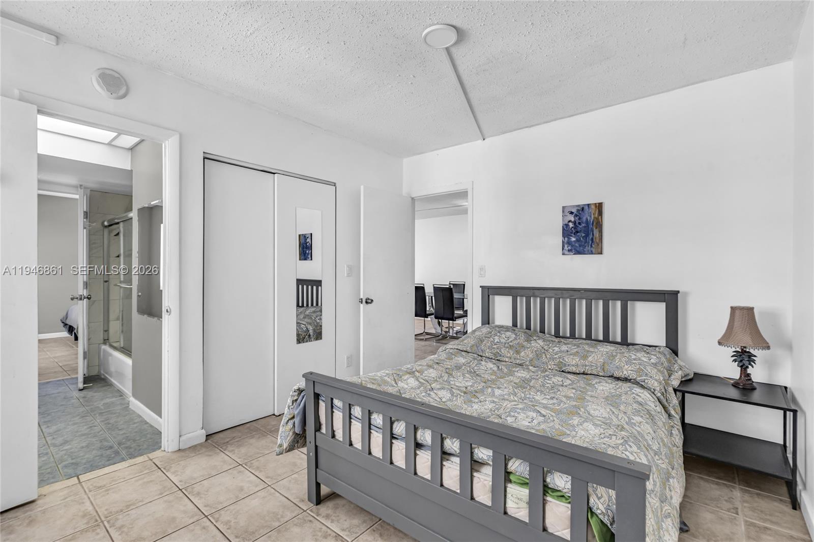 200 South Birch Road, Unit 1015 Fort Lauderdale, FL 33316 - Photo 21 of 36 a view of a bedroom with furniture and windows