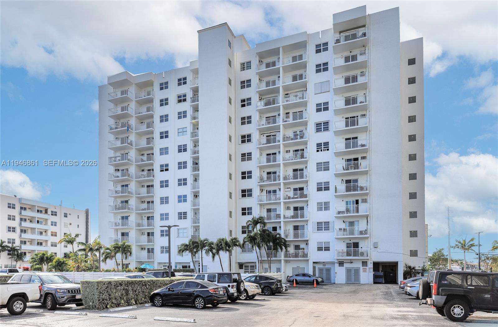 200 South Birch Road, Unit 1015 Fort Lauderdale, FL 33316 - Photo 36 of 36 a view of a building and car parked on the roadside