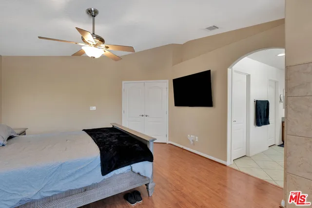 a bathroom with a double vanity sink mirror double shower and a bathtub