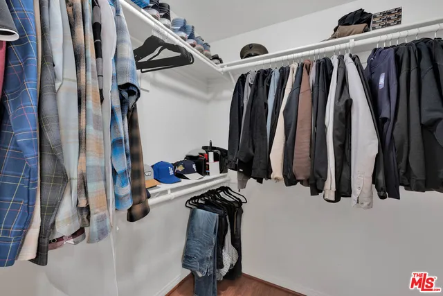 a view of a backyard with a garden and plants