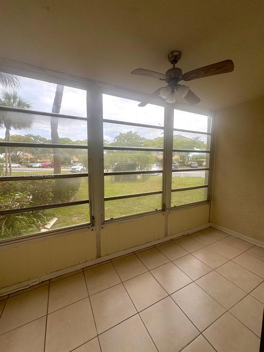4174 Inverrary Drive, Unit 903 Lauderhill, FL 33319 - Photo 33 of 36 a view of a room with window