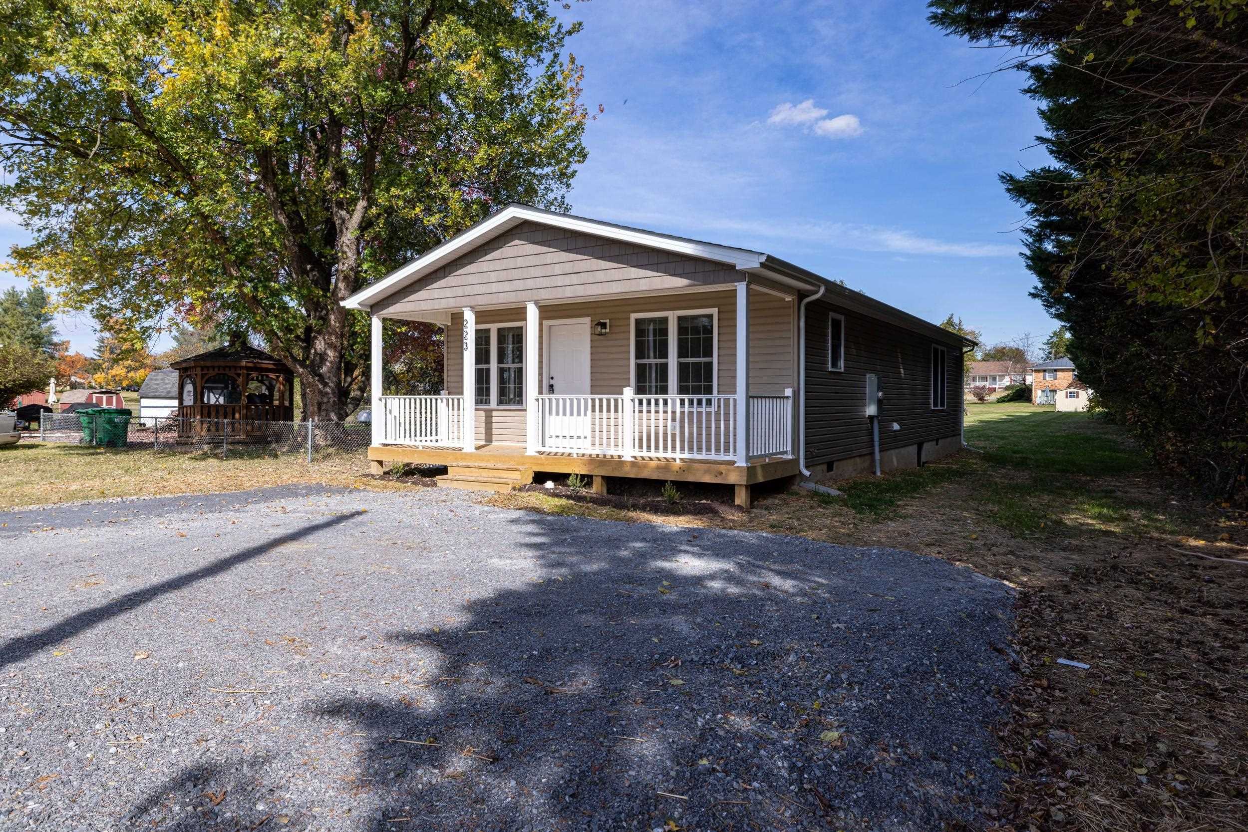 223 Fairview Road Luray, VA 22835 - Photo 33 of 63 a view of a house with yard and a garden