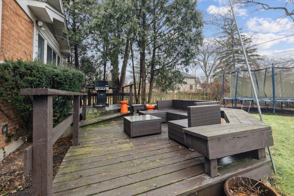 918 Oxford Road Deerfield, IL 60015 - Photo 20 of 26 a view of a patio with couches and potted plants