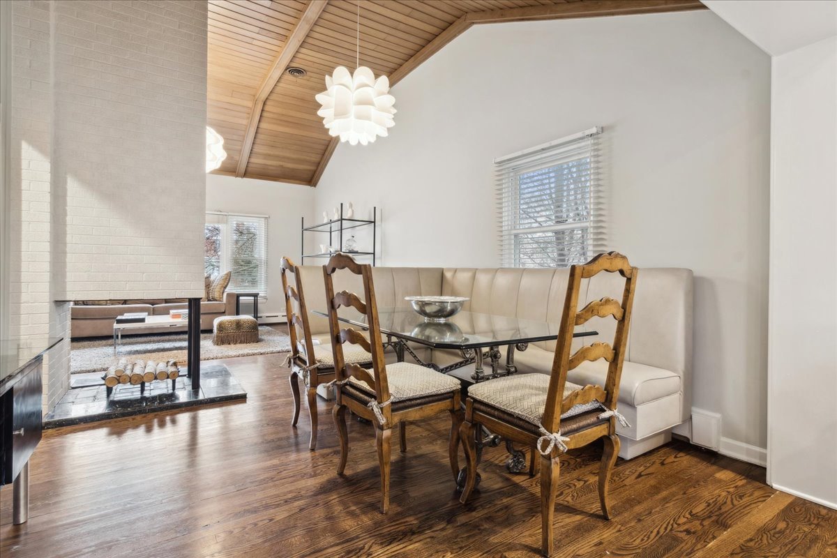 918 Oxford Road Deerfield, IL 60015 - Photo 5 of 26 a view of a dining room with furniture and wooden floor