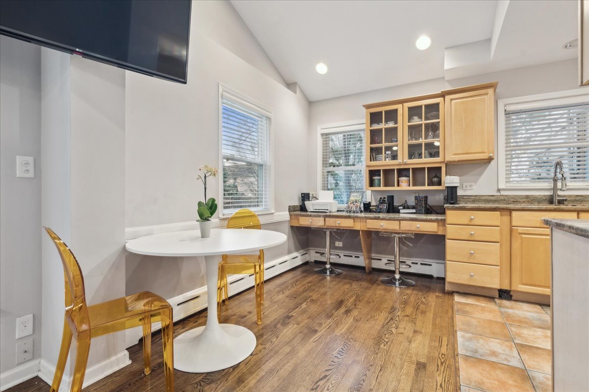 918 Oxford Road Deerfield, IL 60015 - Photo 10 of 26 a workspace with furniture window and wooden floor