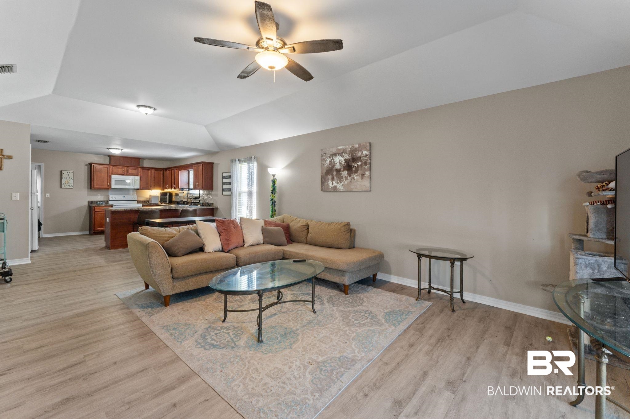 1549 Majesty Loop Foley, AL 36535 - Photo 6 of 25 Living room featuring light wood finished floors, ceiling fan, and lofted ceiling