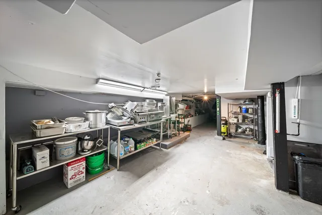 a workspace with furniture and window