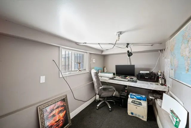 a bathroom with a sink toilet and vanity