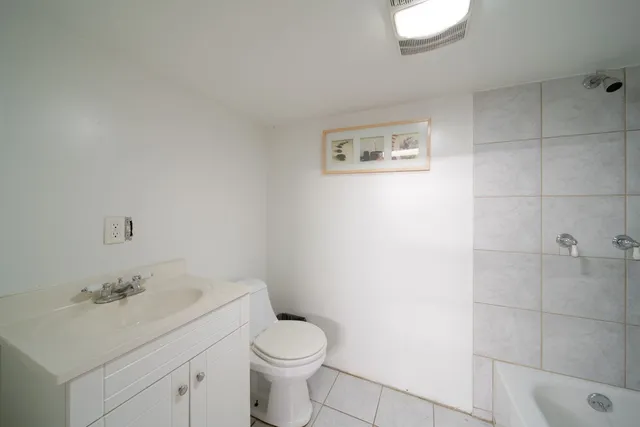 a view of a backyard with sitting area