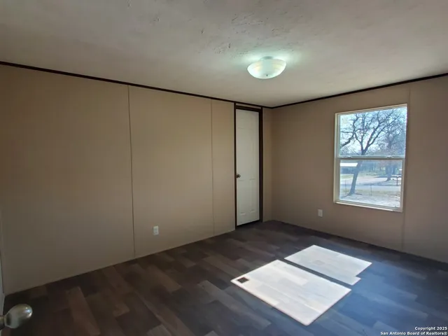 an empty room with windows