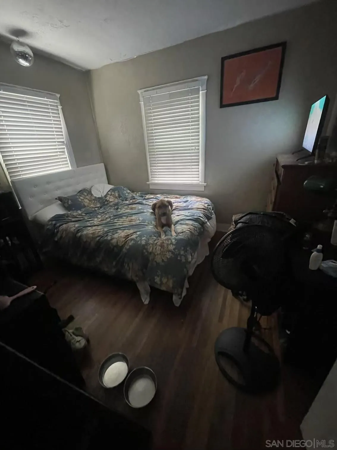 4667-69 35th Street San Diego, CA 92116 - Photo 13 of 29 a bedroom with a bed and window