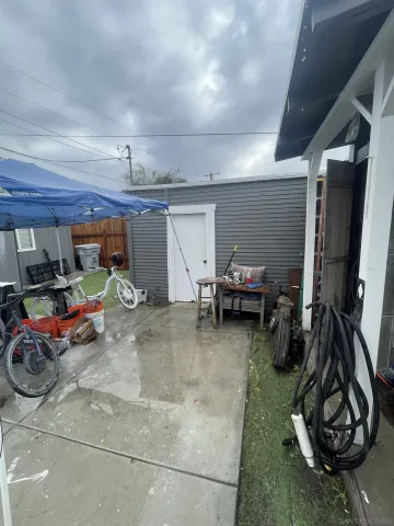 a view of a garage with parked cars