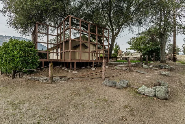 a view of a kitchen with a stove cabinets and a kitchen