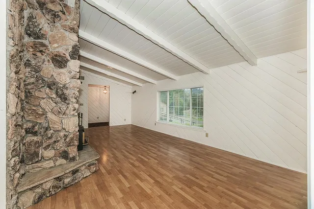 a kitchen with sink cabinets and window