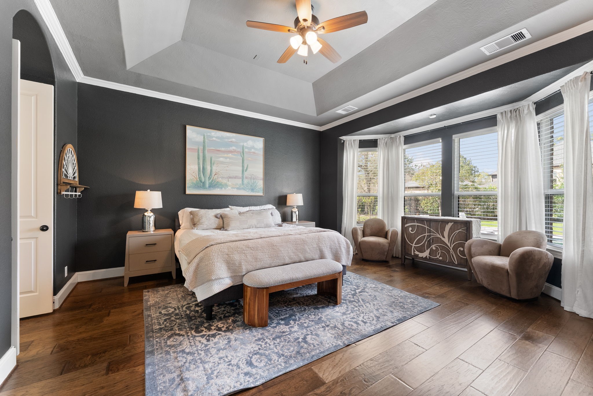 5519 Bright Timber Landing Drive Spring, TX 77386 - Photo 14 of 39 a spacious bedroom with a bed and glass window