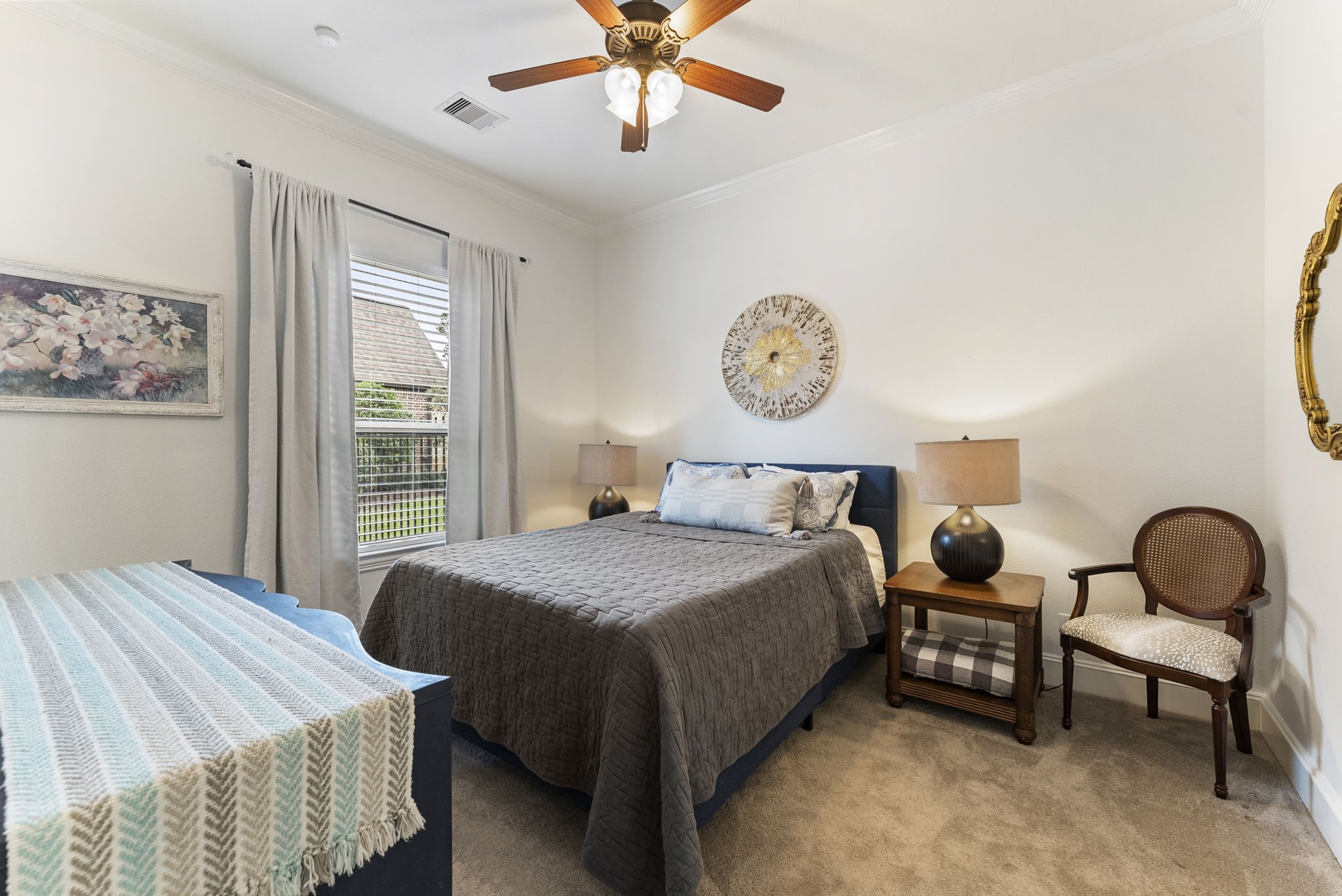 5519 Bright Timber Landing Drive Spring, TX 77386 - Photo 22 of 39 a bedroom with a bed and a window