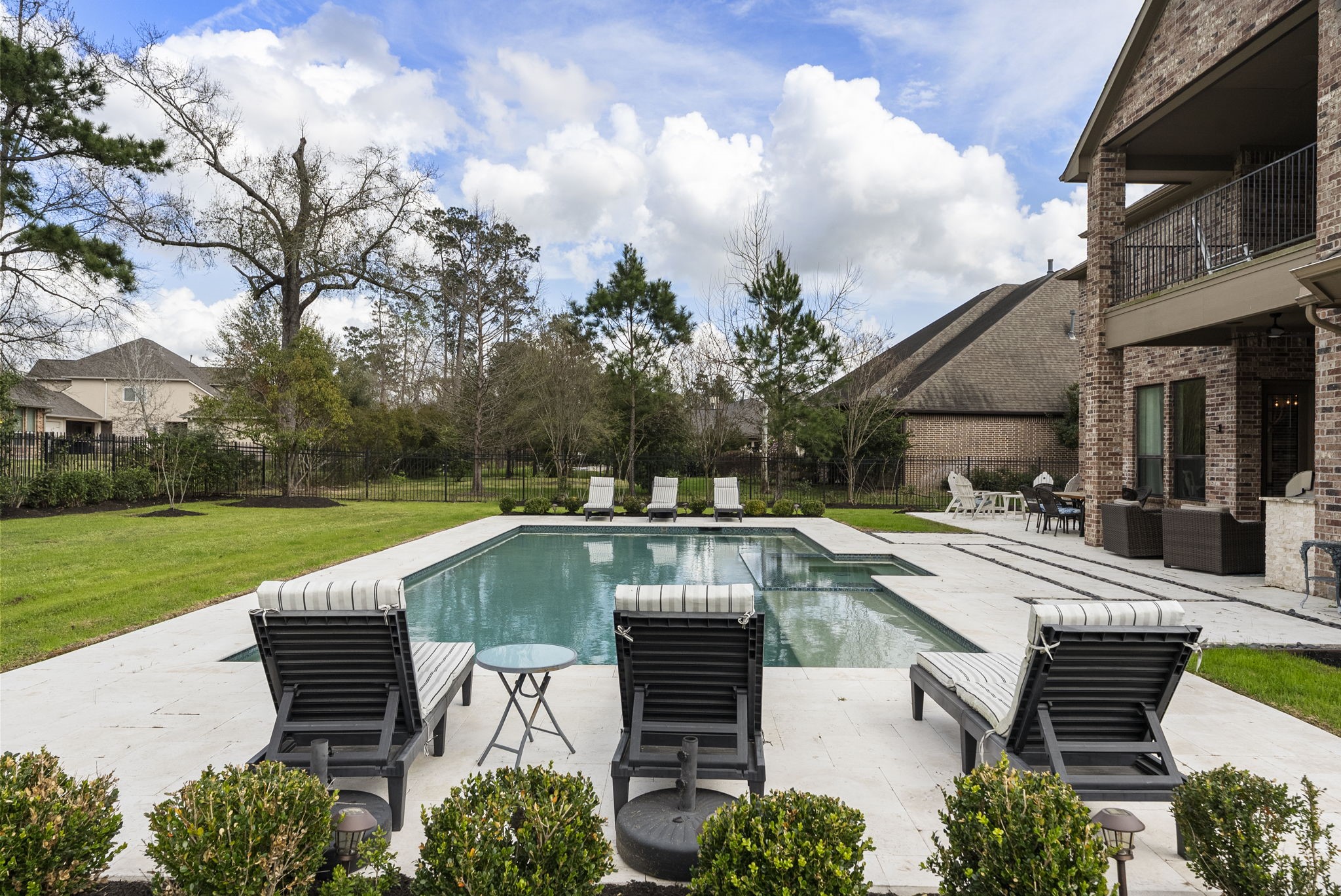 5519 Bright Timber Landing Drive Spring, TX 77386 - Photo 38 of 39 a view of a swimming pool with lounge chair