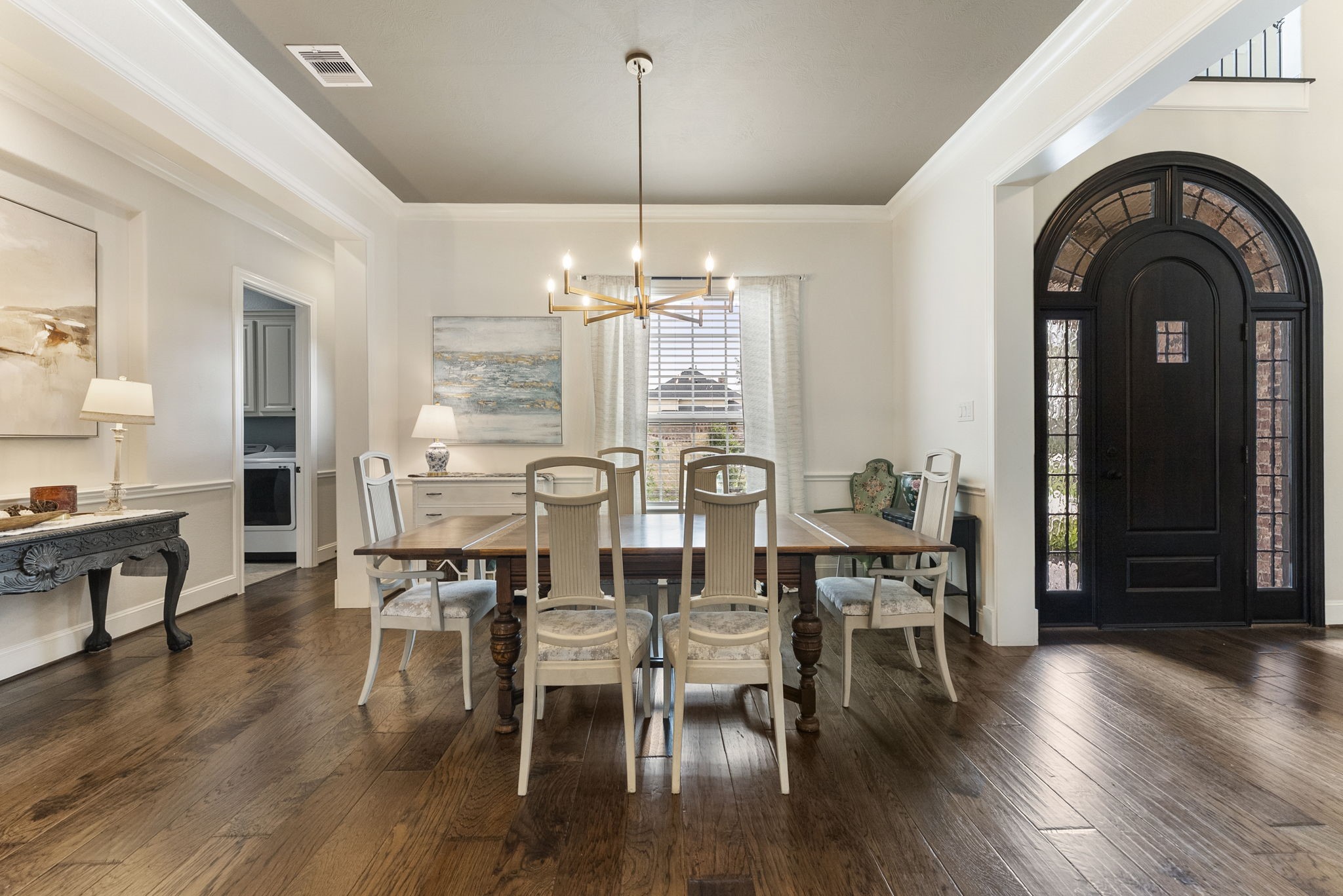 5519 Bright Timber Landing Drive Spring, TX 77386 - Photo 7 of 39 a view of a dining room with furniture window and wooden floor
