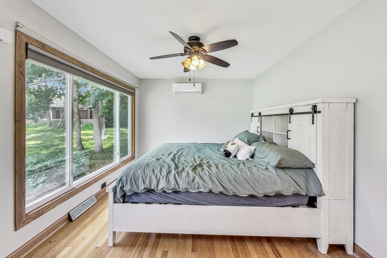 360 South St Marys Road Libertyville, IL 60048 - Photo 15 of 46 a bedroom with a bed and window