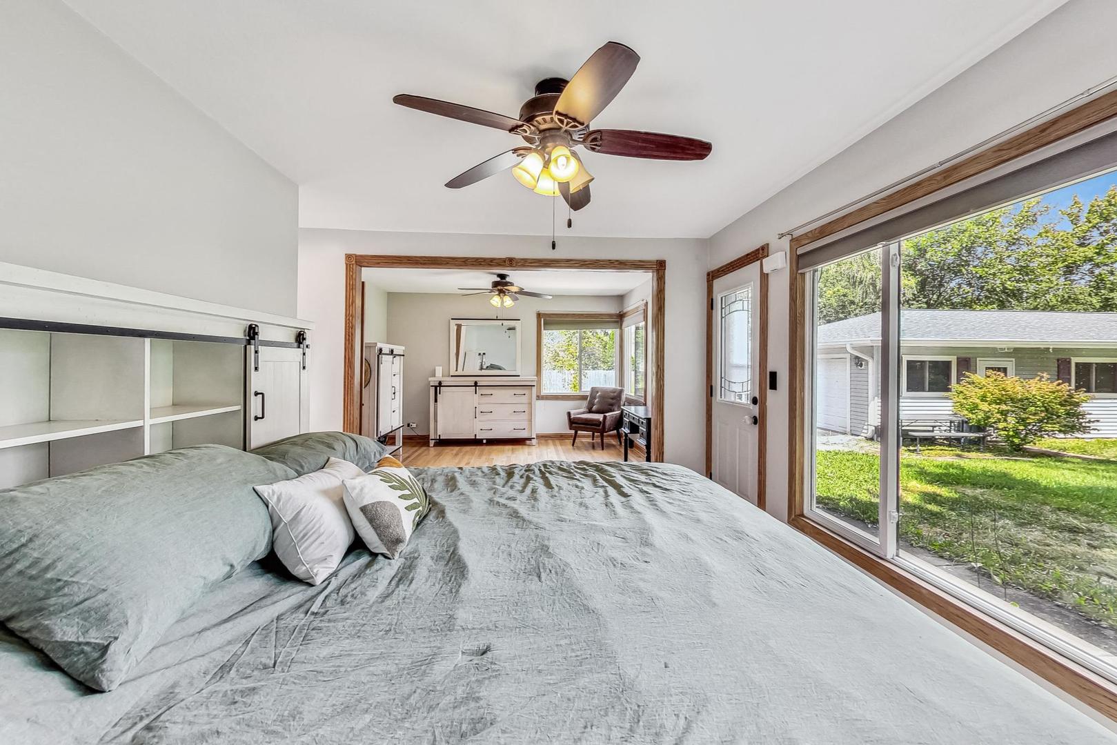360 South St Marys Road Libertyville, IL 60048 - Photo 16 of 46 a bedroom with a large bed and a large window