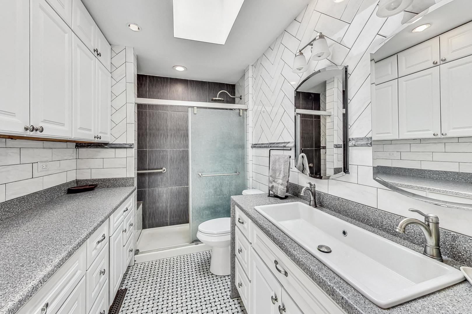 360 South St Marys Road Libertyville, IL 60048 - Photo 20 of 46 a bathroom with a sink a toilet and shower