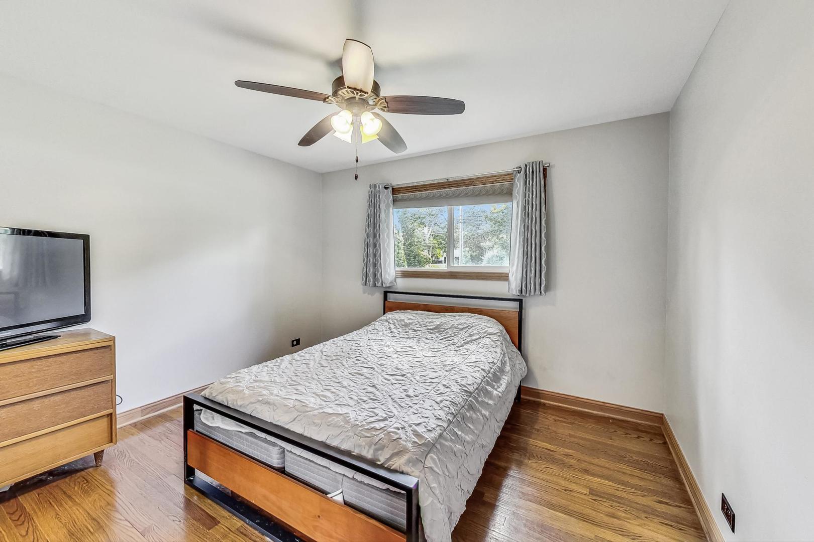 360 South St Marys Road Libertyville, IL 60048 - Photo 22 of 46 a bedroom with bed and window