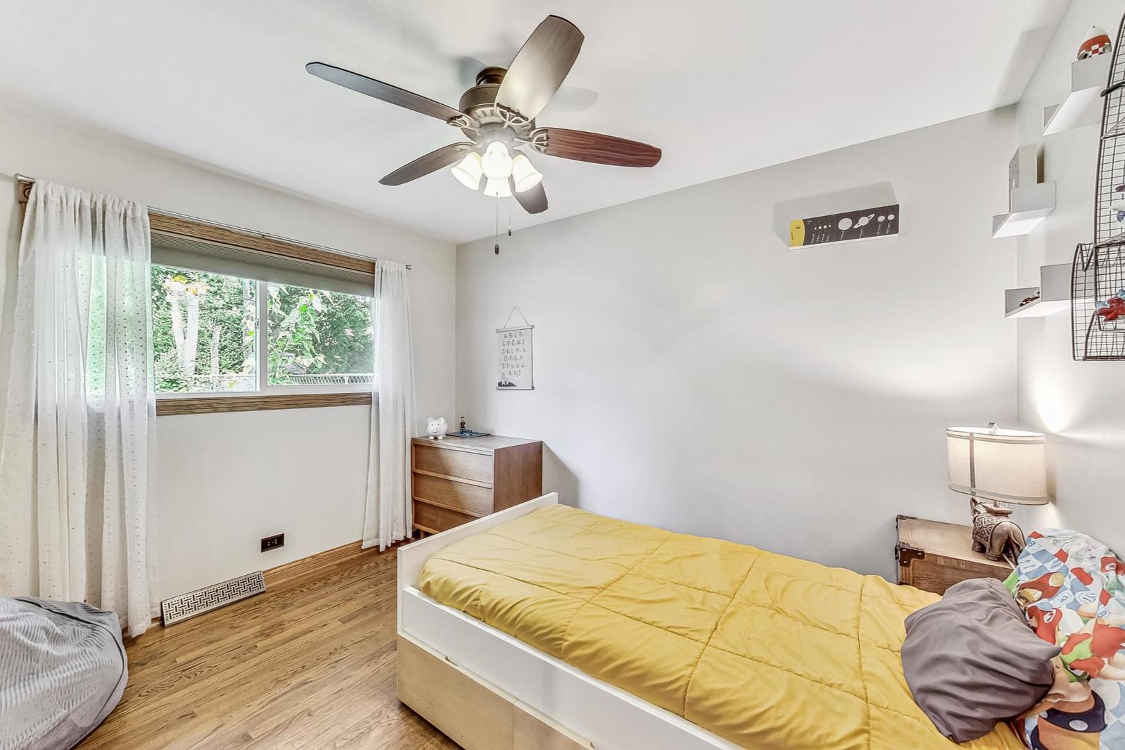 360 South St Marys Road Libertyville, IL 60048 - Photo 25 of 46 a bedroom with a large bed and a window