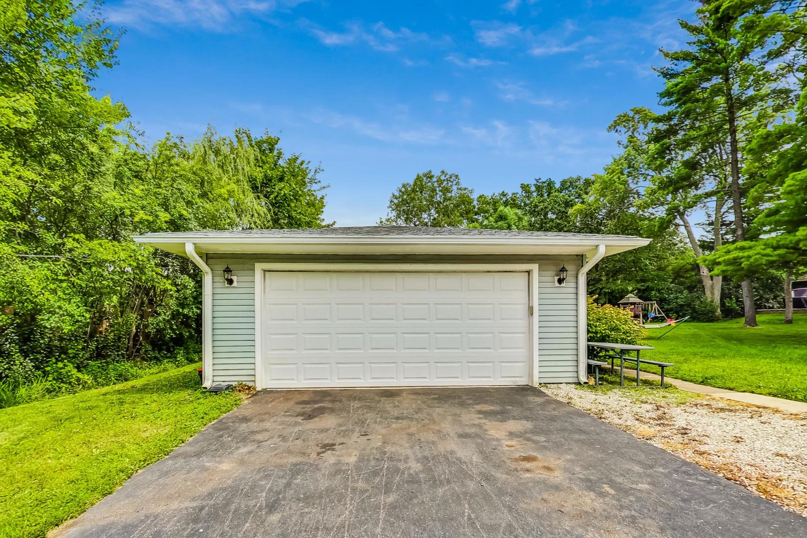 360 South St Marys Road Libertyville, IL 60048 - Photo 37 of 46 front view of a house with a yard