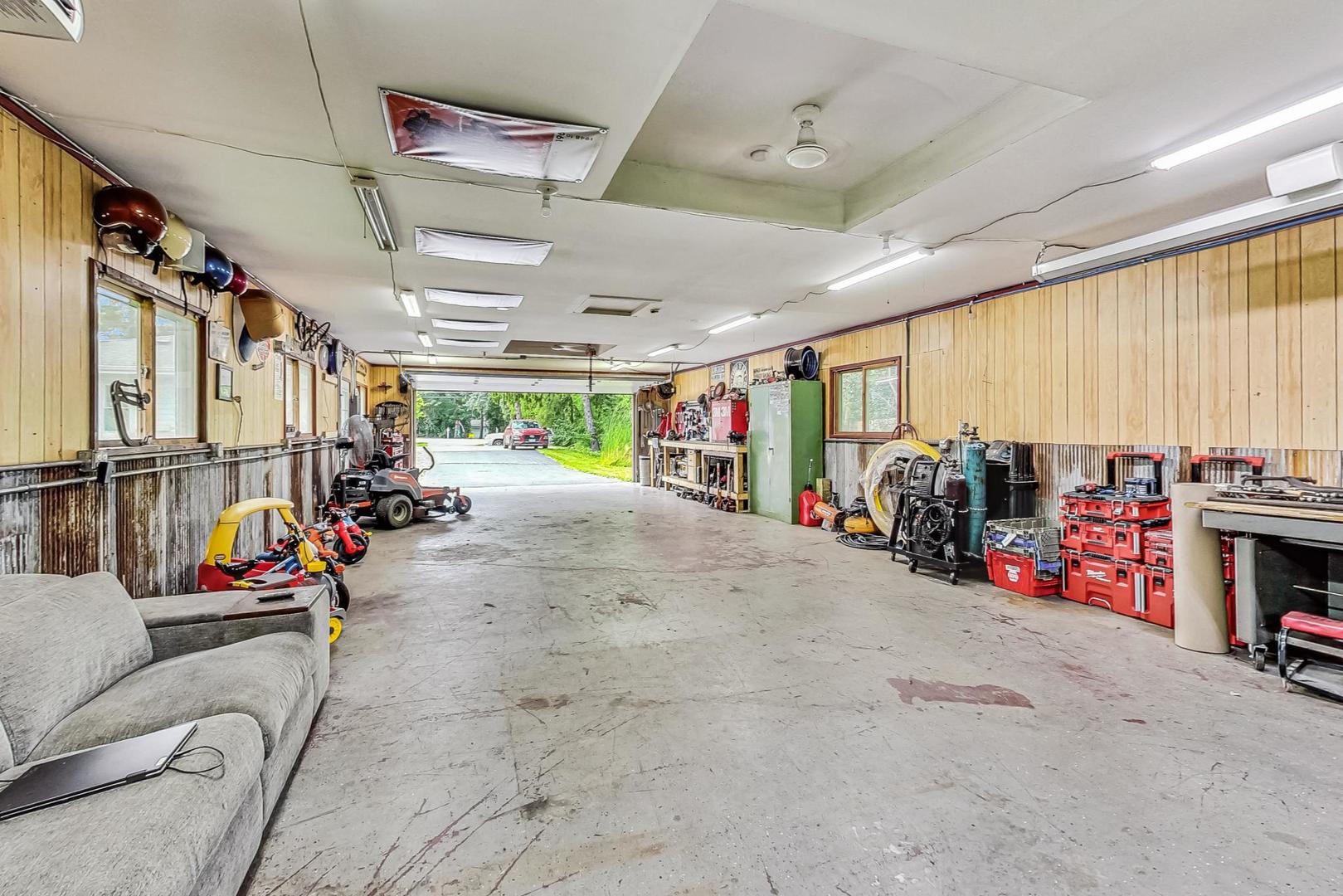 360 South St Marys Road Libertyville, IL 60048 - Photo 38 of 46 a view of a garage with rack and bicycle