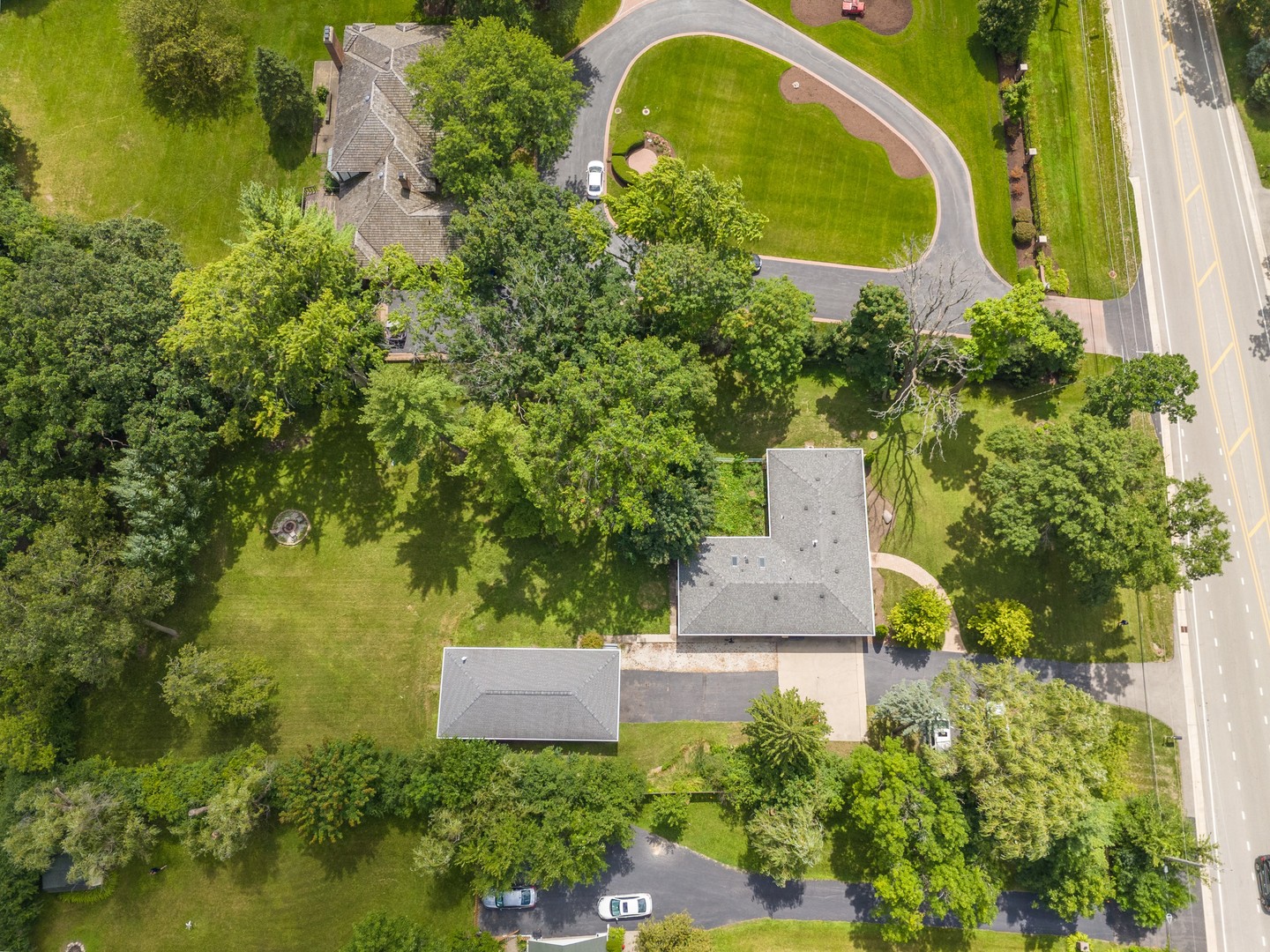 360 South St Marys Road Libertyville, IL 60048 - Photo 40 of 46 an aerial view of a house with swimming pool and garden space