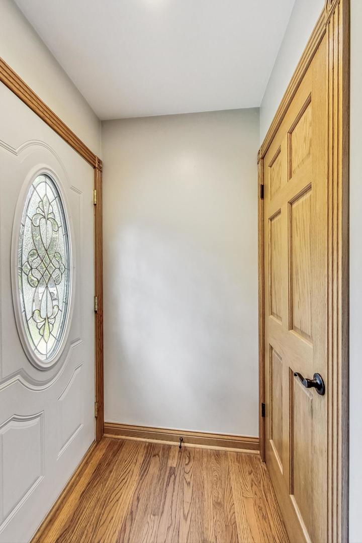 360 South St Marys Road Libertyville, IL 60048 - Photo 4 of 46 a view of a hallway with washer and dryer
