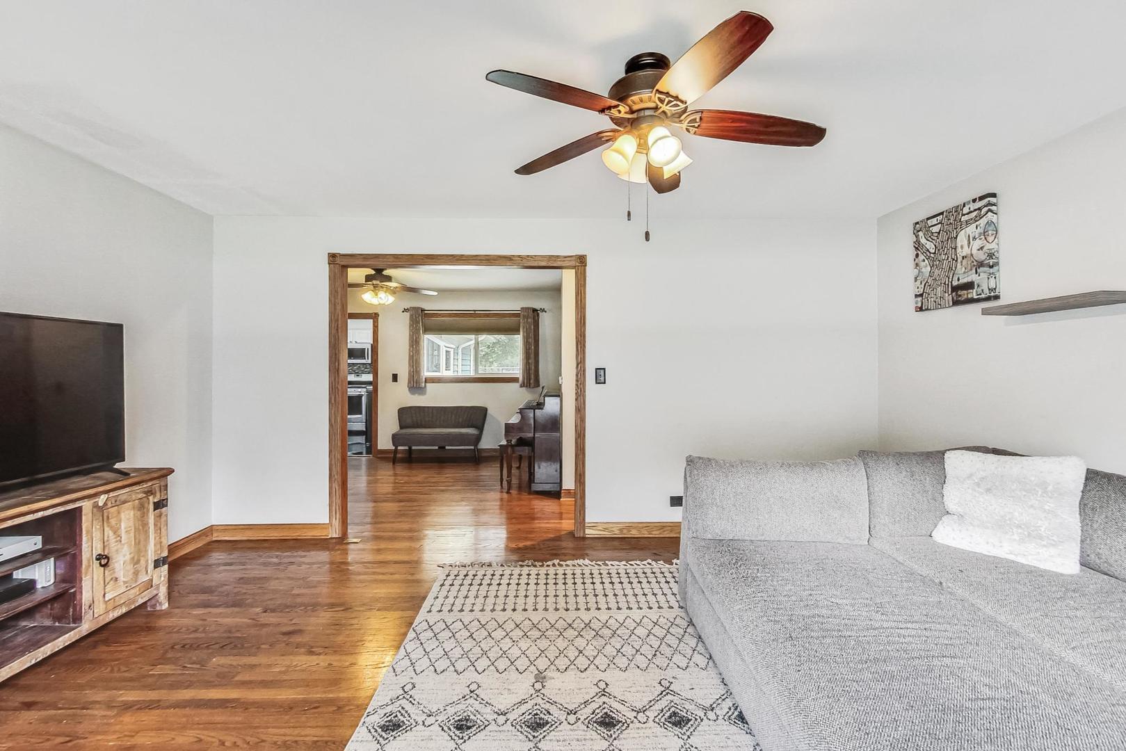 360 South St Marys Road Libertyville, IL 60048 - Photo 6 of 46 a living room with furniture and a flat screen tv
