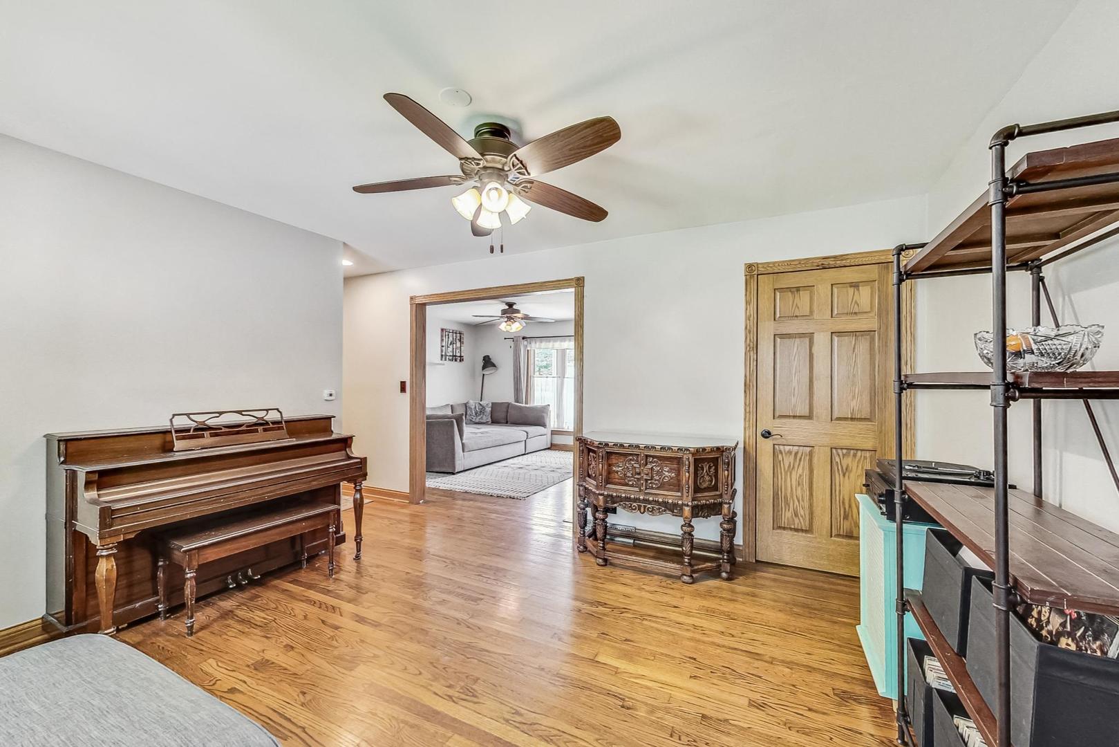 360 South St Marys Road Libertyville, IL 60048 - Photo 10 of 46 a living room with furniture and a piano