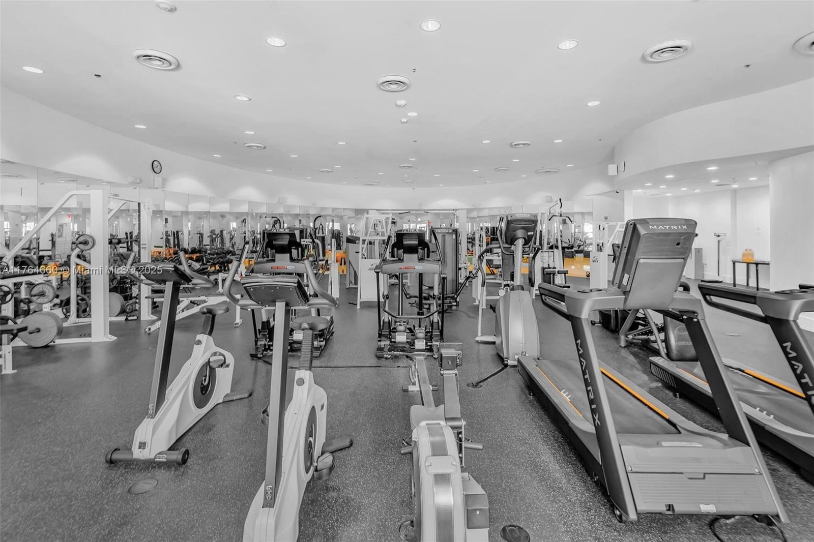 5600 Collins Avenue, Unit 10J Miami Beach, FL 33140 - Photo 17 of 20 a view of a room with gym equipment