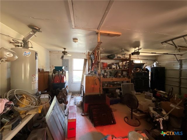 a kitchen with a sink and a stove