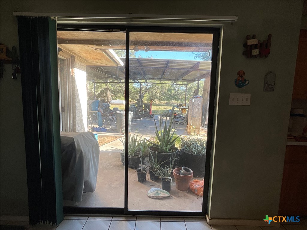 389 Hausmann Road Cuero, TX 77954 - Photo 34 of 48 a view of potted plant in front of a window