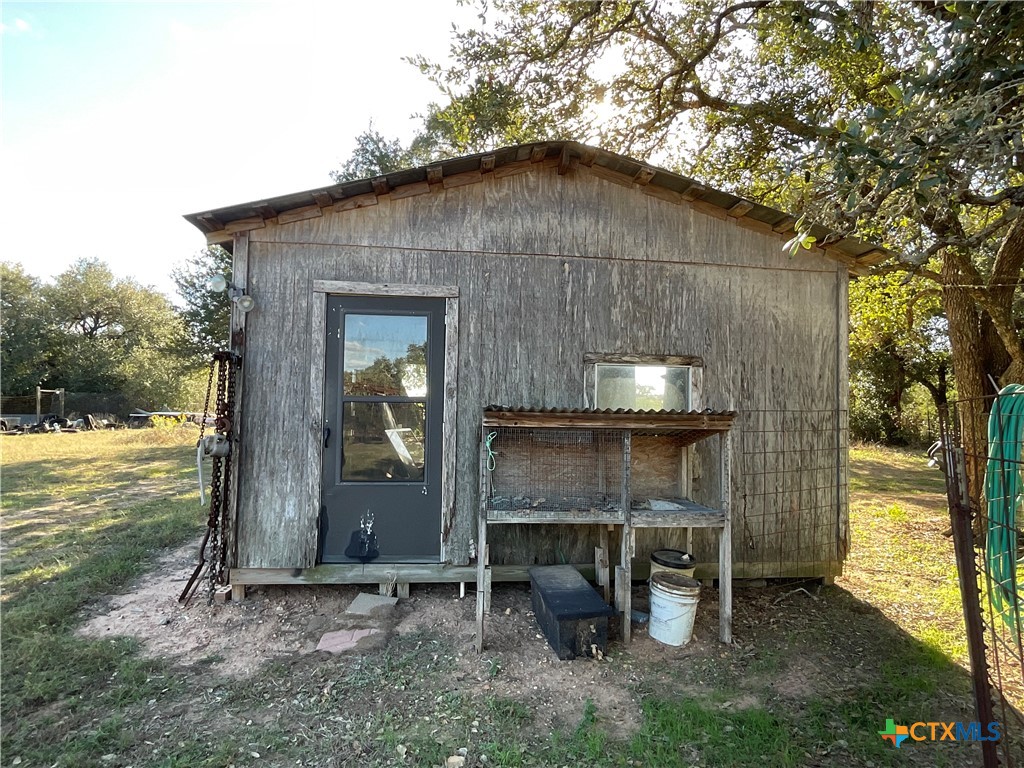 389 Hausmann Road Cuero, TX 77954 - Photo 42 of 48 a front view of a house with a yard