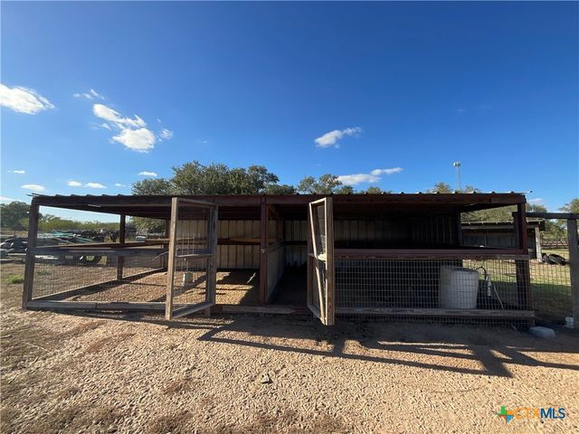 a view of balcony with furniture