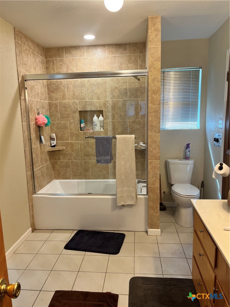 389 Hausmann Road Cuero, TX 77954 - Photo 48 of 48 a bathroom with a bathtub and a shower