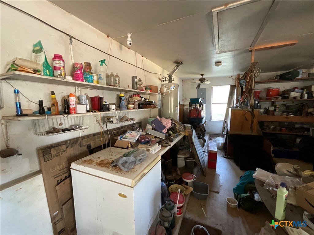 389 Hausmann Road Cuero, TX 77954 - Photo 6 of 48 a view of storage and utility room