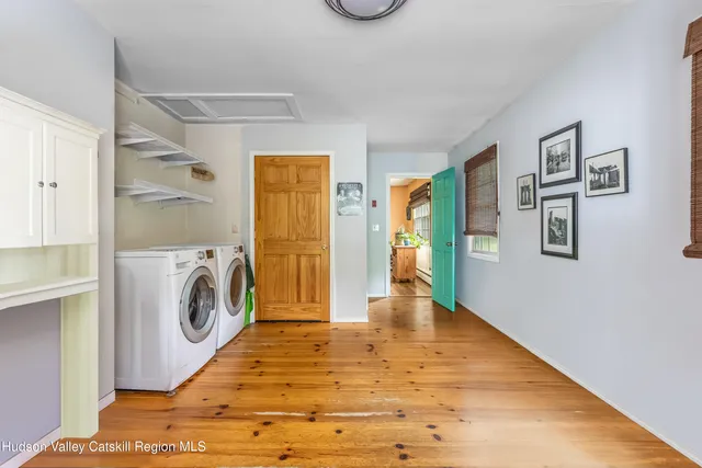 a view of a storage & utility room with washer and dryer