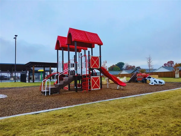 a view of a swimming pool with a lounge chairs