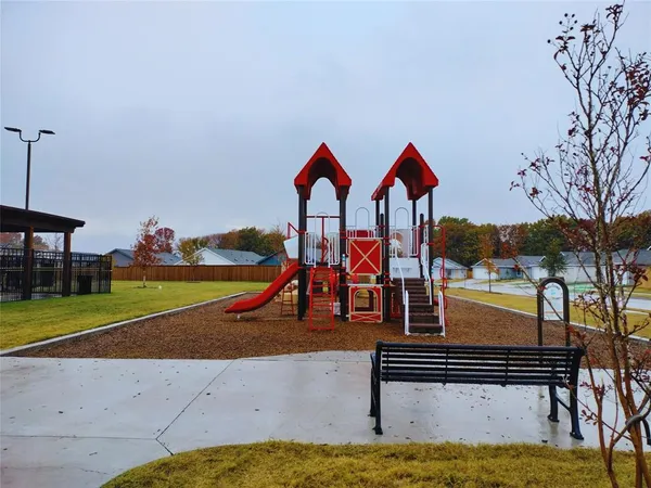 a view of swimming pool with outdoor seating