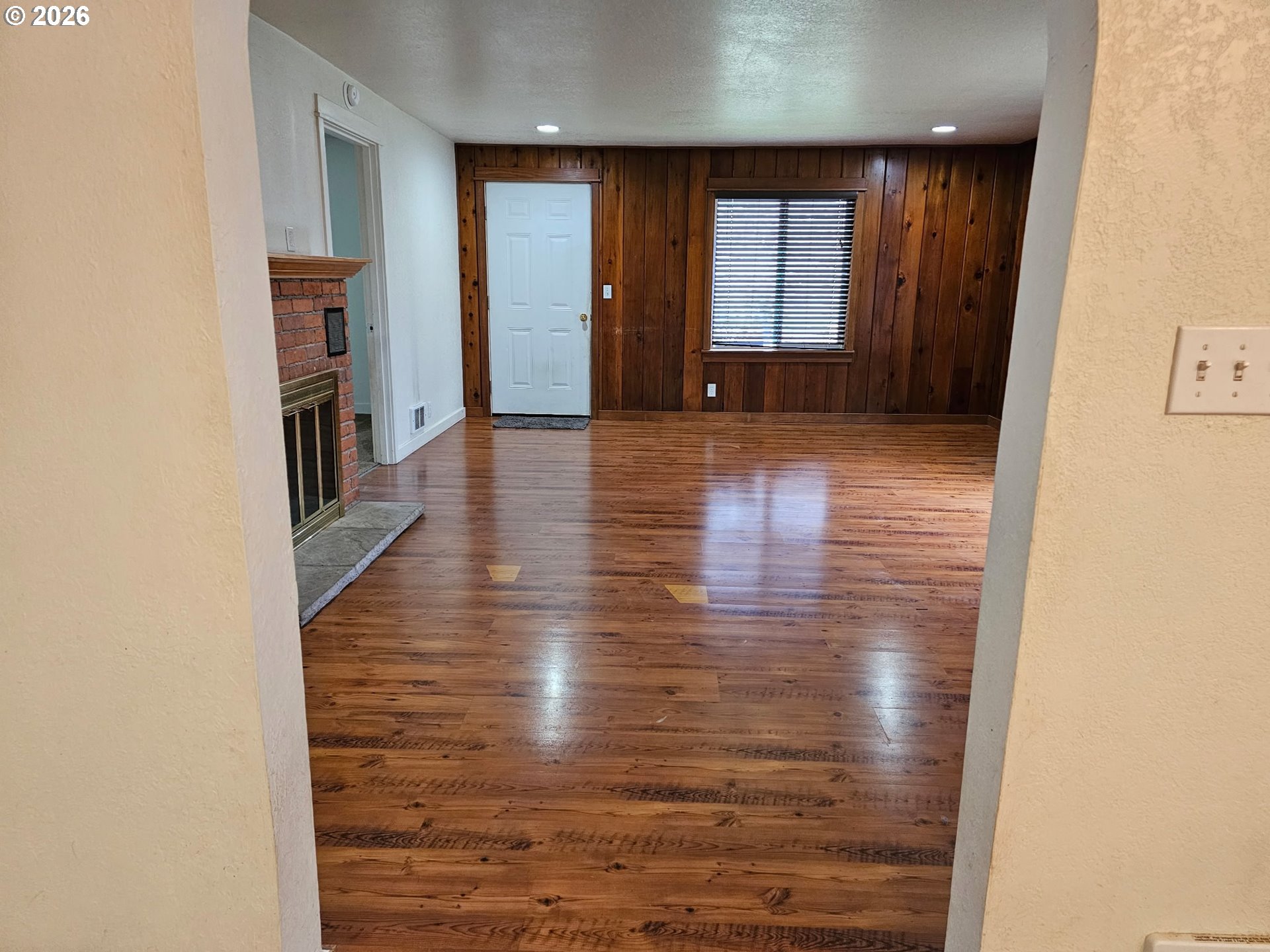 33802 Market Road Creswell, OR 97426 - Photo 6 of 30 a view of a hallway with wooden floor and a bathroom