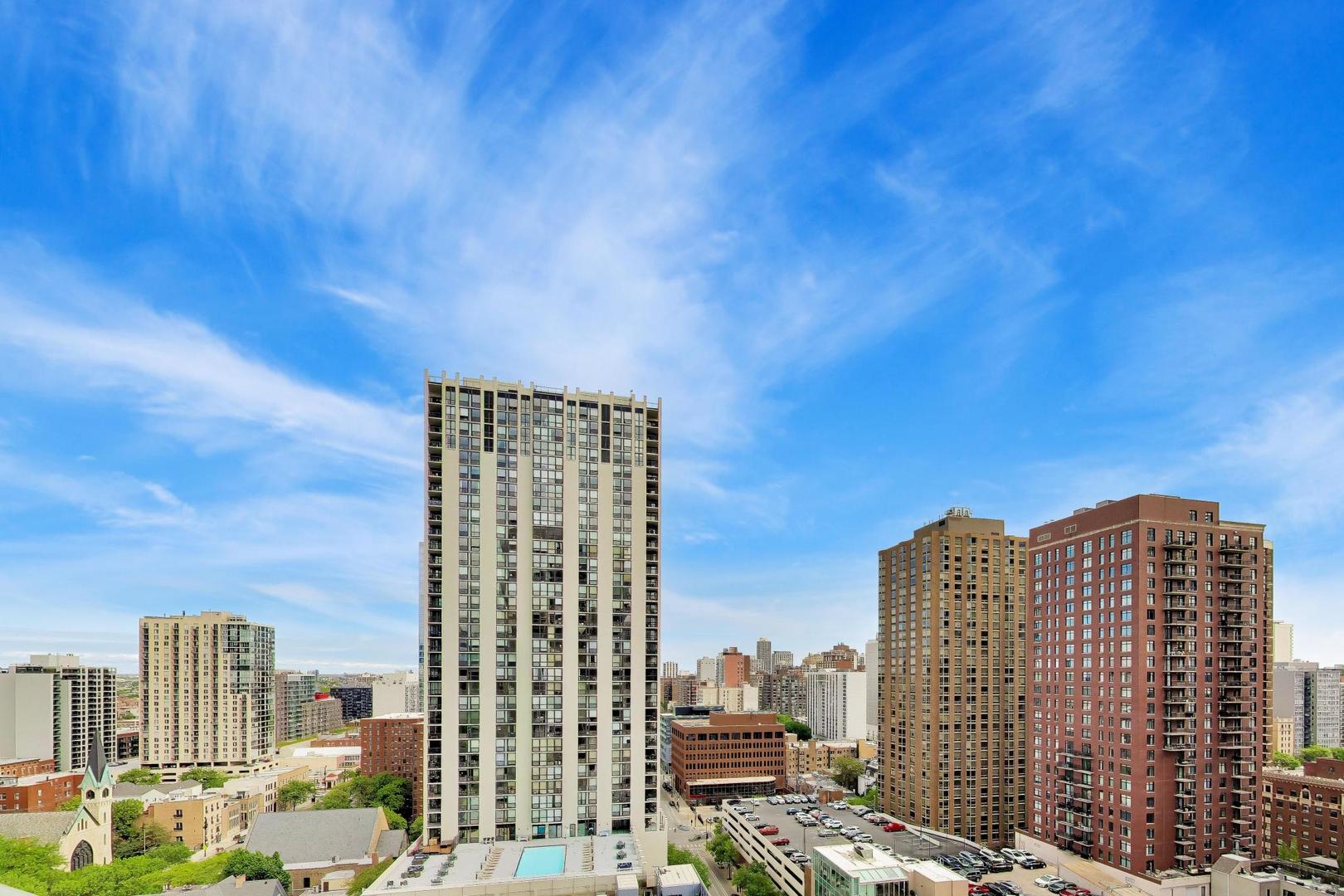 111 West Maple Street, Unit 1503 Chicago, IL 60610 - Photo 30 of 39 a view of a city with tall buildings